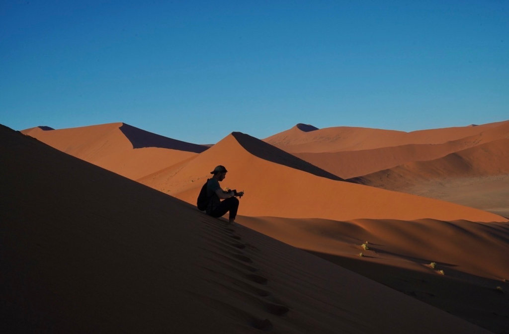 hiking up Dune45 in Sossusvlei, Namibia, nature adventures and beautiful nature travel destinations